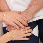 PULSEIRA CRUZ LUZ BANHADO A OURO