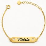 PULSEIRA PLACA NOME OU PROFISSÃO CORAÇÃO VAZADO (PODE SER BANHADO A OURO OU A PRATA)